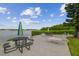 Enjoy this waterfront patio, complete with tables, chairs, and umbrellas at 12760 Indian Rocks Rd # 910, Largo, FL 33774