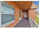 Covered hallway with individual unit entrances at 12760 Indian Rocks Rd # 910, Largo, FL 33774