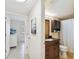 Clean bathroom with a vanity, toilet and shower at 12760 Indian Rocks Rd # 910, Largo, FL 33774