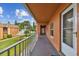 Building hallway with access to multiple units and outdoor views at 12760 Indian Rocks Rd # 910, Largo, FL 33774