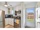 Modern kitchen with stainless steel appliances and ample cabinet space at 12760 Indian Rocks Rd # 910, Largo, FL 33774