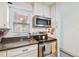 Kitchen with stainless steel appliances and a window overlooking the backyard at 12760 Indian Rocks Rd # 910, Largo, FL 33774