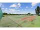 Community tennis court with surrounding greenery at 12760 Indian Rocks Rd # 910, Largo, FL 33774