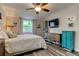 Spacious bedroom with a queen-size bed and a flat-screen TV at 2219 Beach S Blvd, Gulfport, FL 33707