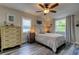 Cozy bedroom with a queen-size bed and ample closet space at 2219 Beach S Blvd, Gulfport, FL 33707