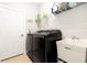 Laundry room with washer, dryer, and utility sink at 4359 70Th Street E Cir, Palmetto, FL 34221