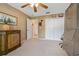Spacious bedroom with double door closet and adjacent bathroom at 34802 Double Eagle Ct, Zephyrhills, FL 33541