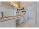 Double vanity bathroom with a separate shower and toilet at 34802 Double Eagle Ct, Zephyrhills, FL 33541