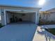 Spacious two-car garage with ample storage space at 10437 Grail Ave, Englewood, FL 34224