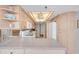 Well-equipped kitchen with light wood cabinets and modern appliances at 11590 Shipwatch Dr # 548, Largo, FL 33774