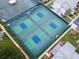 Aerial view of well-maintained tennis and pickleball courts at 11590 Shipwatch Dr # 548, Largo, FL 33774
