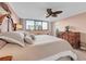 Spacious main bedroom with a king-size bed and large windows at 11590 Shipwatch Dr # 548, Largo, FL 33774