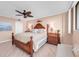 Spacious bedroom with a king-size bed and wooden furniture at 11590 Shipwatch Dr # 548, Largo, FL 33774