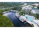 Drone view of community pool, marina, and tennis courts at 11590 Shipwatch Dr # 548, Largo, FL 33774