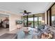 Bright living room with a view of the water and bedroom at 11590 Shipwatch Dr # 548, Largo, FL 33774