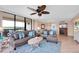 Open living area with a large sectional sofa and a view at 11590 Shipwatch Dr # 548, Largo, FL 33774