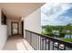 Private balcony overlooking a tranquil pond and community at 11590 Shipwatch Dr # 548, Largo, FL 33774