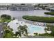 Resort-style pool and clubhouse with water access at 11590 Shipwatch Dr # 548, Largo, FL 33774