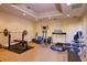 Well-equipped exercise room featuring a weight bench, elliptical machine, treadmill, and various workout equipment at 15 Somerset St # 6A, Clearwater Beach, FL 33767