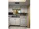 Kitchen with double sink, dishwasher, and view at 601 N Hercules Ave # 103, Clearwater, FL 33765