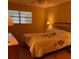 Bright bedroom with a double bed and wood floors at 601 N Hercules Ave # 103, Clearwater, FL 33765