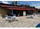 Outdoor seating area near the pool at 601 N Hercules Ave # 103, Clearwater, FL 33765