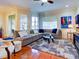 Spacious living room with hardwood floors and sectional sofa at 1513 Wharfside Dr # 1513, Tarpon Springs, FL 34689