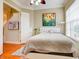 Relaxing bedroom with king-size bed and large window with blinds at 1513 Wharfside Dr # 1513, Tarpon Springs, FL 34689