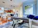 Open living room, kitchen and dining area at 1513 Wharfside Dr # 1513, Tarpon Springs, FL 34689