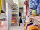 Spacious walk-in closet with ample shelving and hanging space at 1513 Wharfside Dr # 1513, Tarpon Springs, FL 34689
