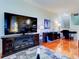 Living room features a fireplace and built-in shelving at 1513 Wharfside Dr # 1513, Tarpon Springs, FL 34689