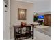 Bright and airy entryway with decorative console table at 12760 Indian Rocks Rd # 510, Largo, FL 33774