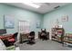 Community room with computers, printer, and seating at 12760 Indian Rocks Rd # 510, Largo, FL 33774