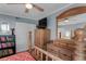 Bright bedroom with a wooden dresser and large mirror at 12760 Indian Rocks Rd # 510, Largo, FL 33774