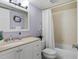 Clean bathroom with a white vanity and bathtub at 12760 Indian Rocks Rd # 510, Largo, FL 33774