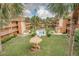 Community courtyard featuring a pool and picnic area at 12760 Indian Rocks Rd # 510, Largo, FL 33774