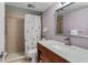 Bathroom with shower, vanity, and marble countertop at 12760 Indian Rocks Rd # 510, Largo, FL 33774
