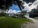 Single story home with landscaped yard at 6324 Austrian Blvd, Punta Gorda, FL 33982