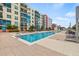 Resort-style pool with plenty of lounge chairs and tables at 1120 E Kennedy Blvd # 734, Tampa, FL 33602
