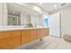 Spa-like bathroom with dual sinks and a large walk-in shower at 1120 E Kennedy Blvd # 734, Tampa, FL 33602