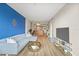 Living area with sectional sofa and view into kitchen at 1120 E Kennedy Blvd # 734, Tampa, FL 33602
