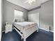 Bedroom with queen bed and nightstand at 10539 Audie Brook Dr, Spring Hill, FL 34608