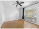 Spacious bedroom with large window and ceiling fan at 18203 Collridge Dr, Tampa, FL 33647