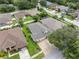 Aerial view showcasing a single-Gathering home's exterior and surrounding neighborhood at 18203 Collridge Dr, Tampa, FL 33647