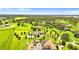 Sprawling estate with meticulously manicured lawn in a beautiful green area at 10603 Low Oak Ter, Thonotosassa, FL 33592
