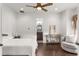 Bedroom with hardwood floors and ensuite bathroom at 10603 Low Oak Ter, Thonotosassa, FL 33592
