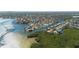 Aerial view of a waterfront community with lush greenery and canal access at 1661 Watermark Ne Cir # C, St Petersburg, FL 33702