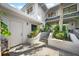 Inviting entrance with lush landscaping, creating a warm and welcoming curb appeal at 1661 Watermark Ne Cir # C, St Petersburg, FL 33702