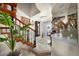 Stunning home entrance with beautiful stairs, tile floors, and an abundance of natural light at 1661 Watermark Ne Cir # C, St Petersburg, FL 33702
