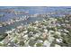 Aerial view of the neighborhood, highlighting the waterfront location and residential community at 411 Harbor View Ln, Largo, FL 33770